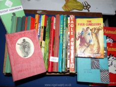 A wooden crate of children's books to include; Eagle Annuals, Girl Annuals, Four Cameleers,