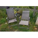 Two fold up metal/plastic garden chairs.