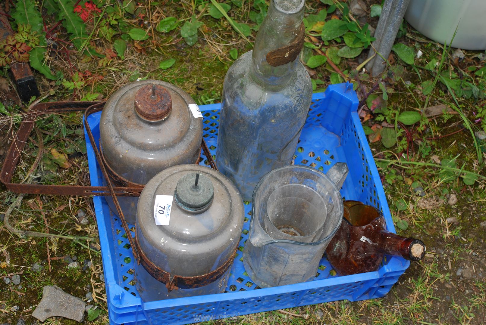 Two paraffin heater bottles, an old bottle, etc.