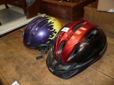 Two bike helmets.
