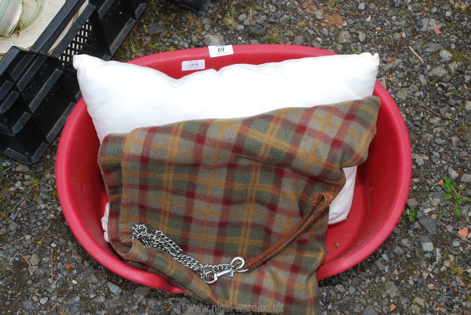 A small pet bed, blankets, etc.