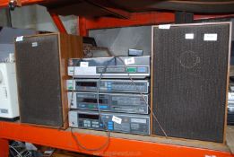 A Sony HI-fi system with speakers and remote.