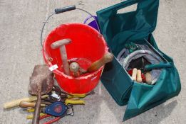 A plastic bucket, garden tools, tin snips, etc.