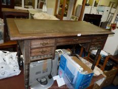 An Edwardian Mahogany writing Desk with green leather insert,