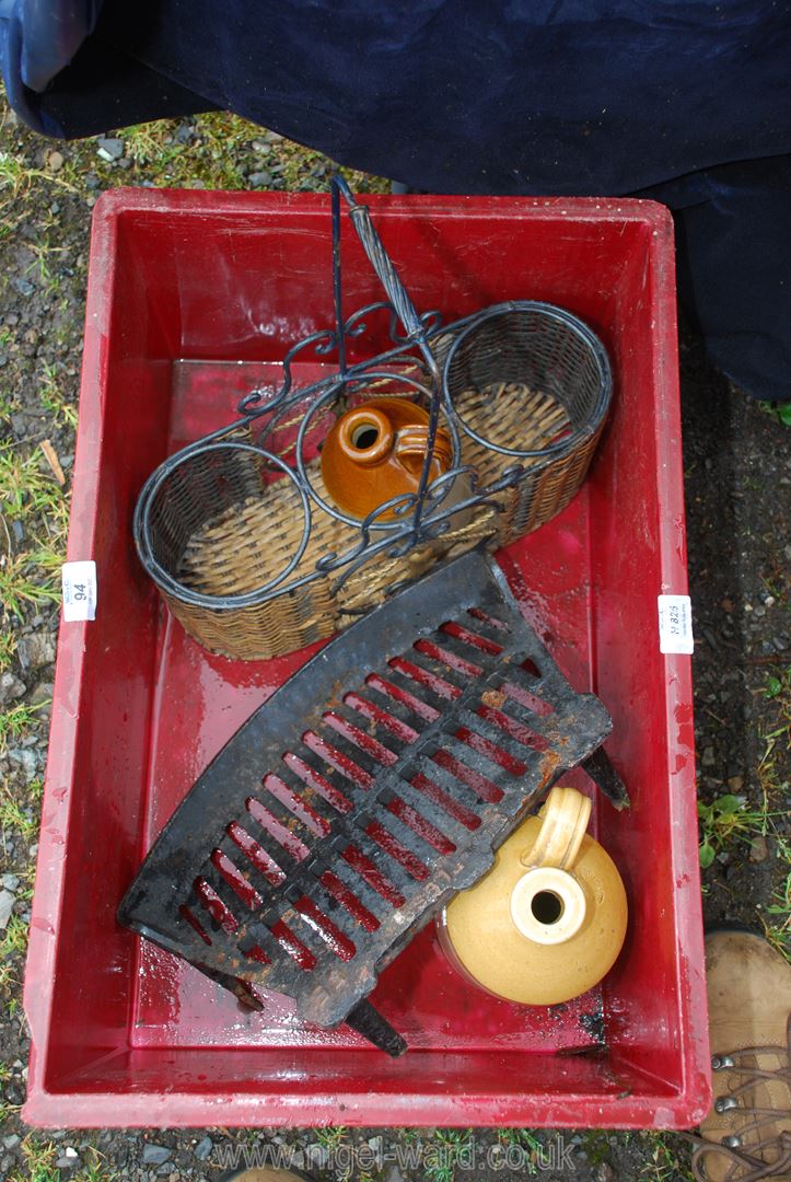 Stone jars, fire grate and bottle carrier.