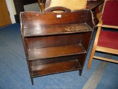 An Oak floor standing bookcase.