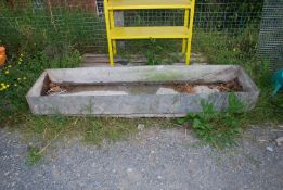 A galvanised trough, 17 1/2' 'x 6'' x 8'' deep.