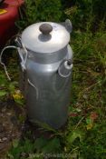 An aluminium caravan kettle.