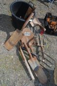A quantity of garden tools - stainless steel forks, shovels, spades, etc, all lacking handles.