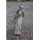 A concrete statue of a lady 40" tall.