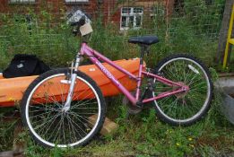 An Apollo 18 gear pink child's bike.