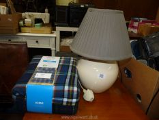 A duvet set (new) and table lamp.