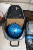 A Ten pin bowling ball in bag by Brunswick Crown Dual.