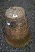 A terracotta Rhubarb Forcer with lid.
