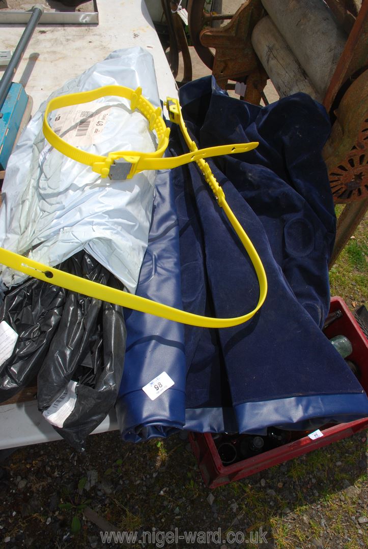 A single blow up bed plus plastic straps and winter car snow chains.