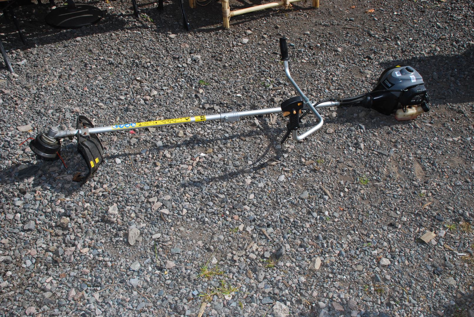 A Titan petrol strimmer.