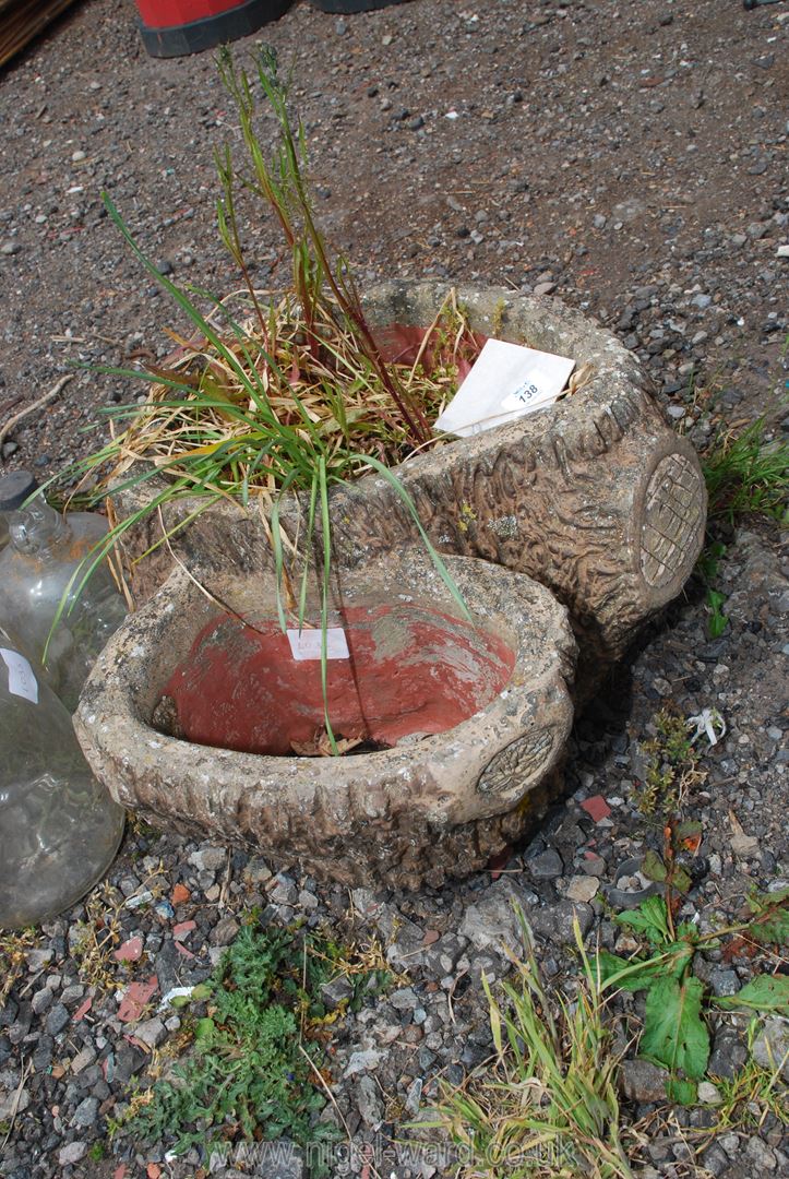 A log effect concrete planter.