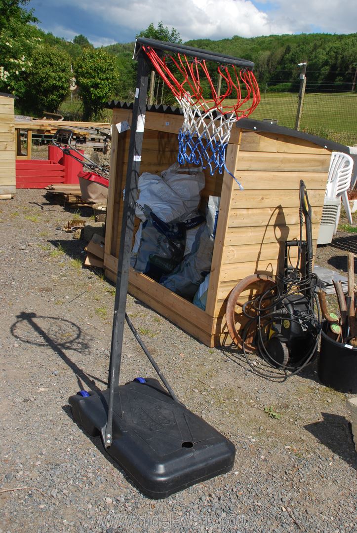 A Basketball Stand and Net, adjustable Inco Sports height a/f.