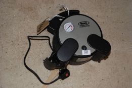 A Rain Automotive 240 volt Compressor.