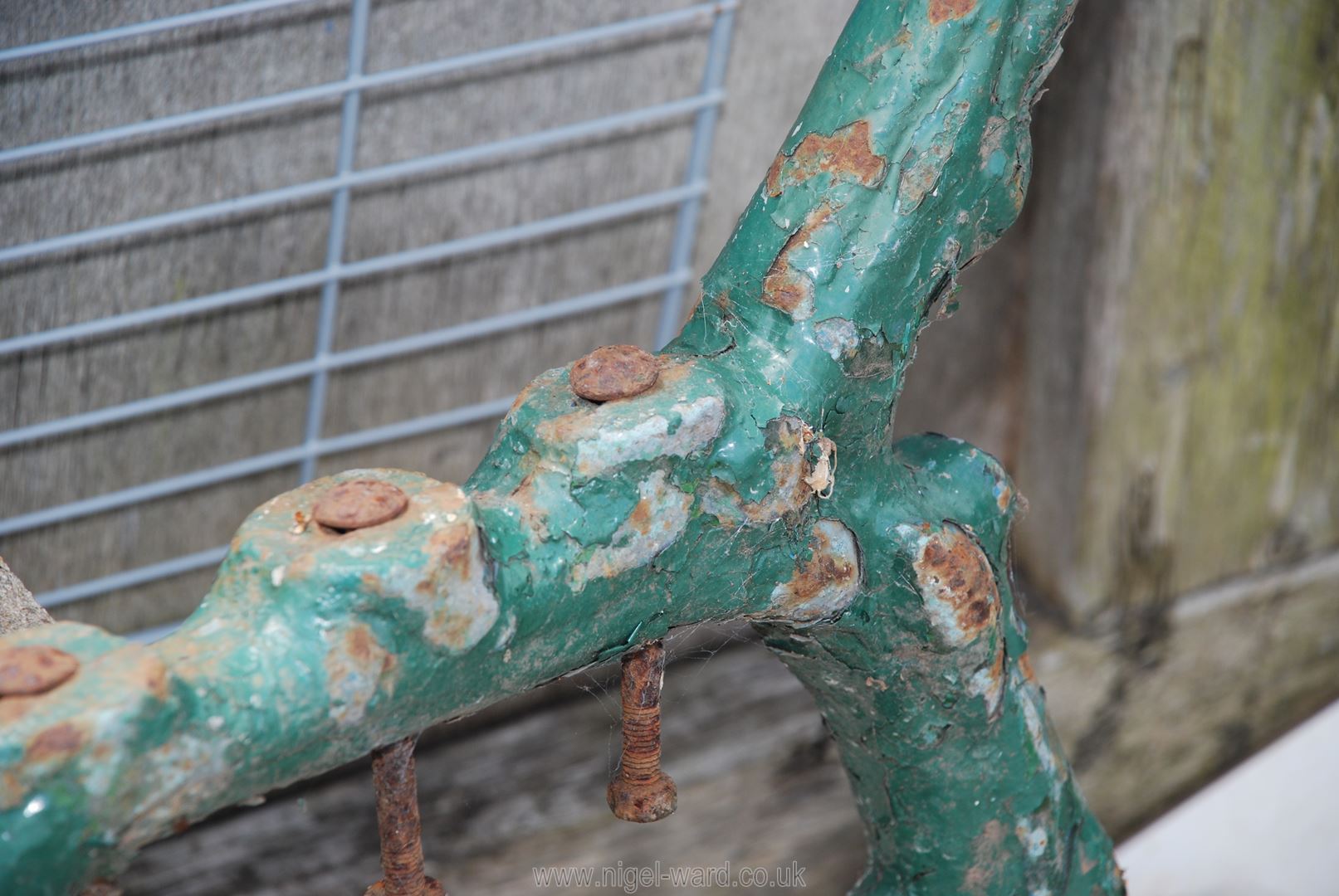 A pair of bench ends in tree trunk pattern. - Image 2 of 2