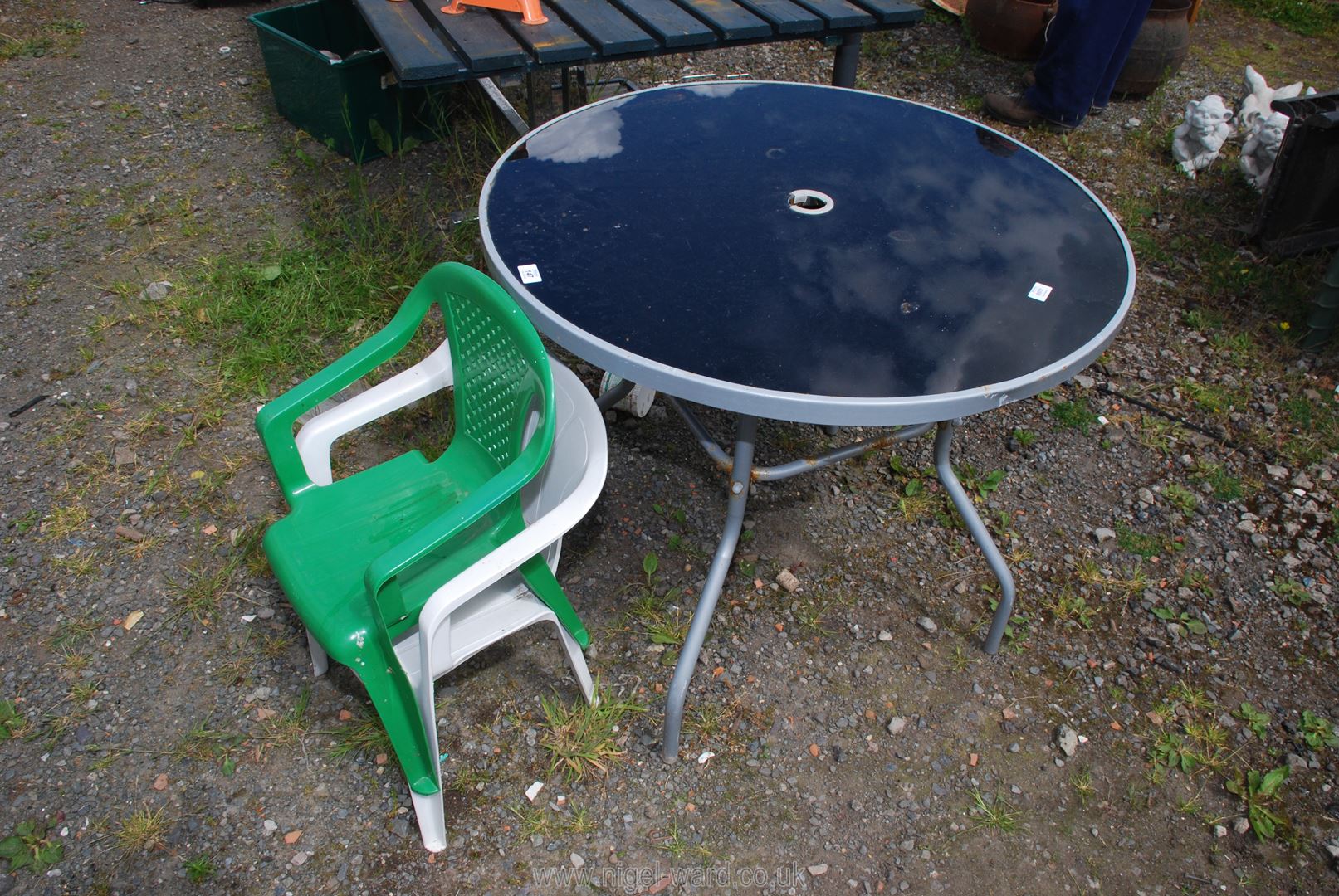 A glass topped table, 34" diameter with two plastic children's chairs. - Image 2 of 2