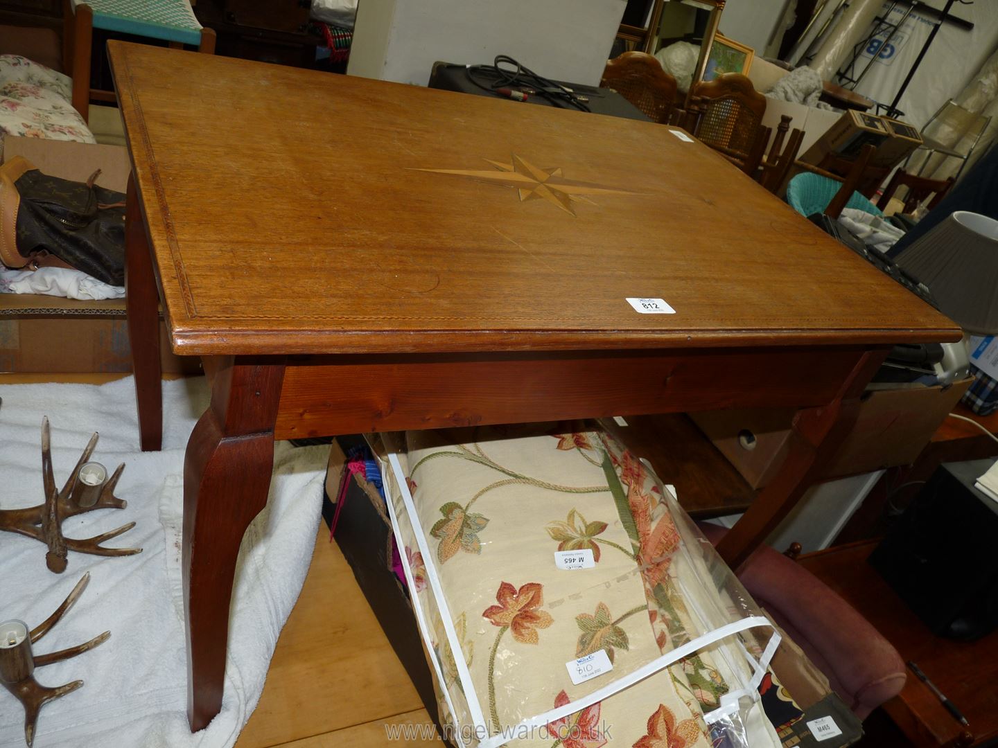 A Mahogany rectangular occasional table with herringbone crossbanding.