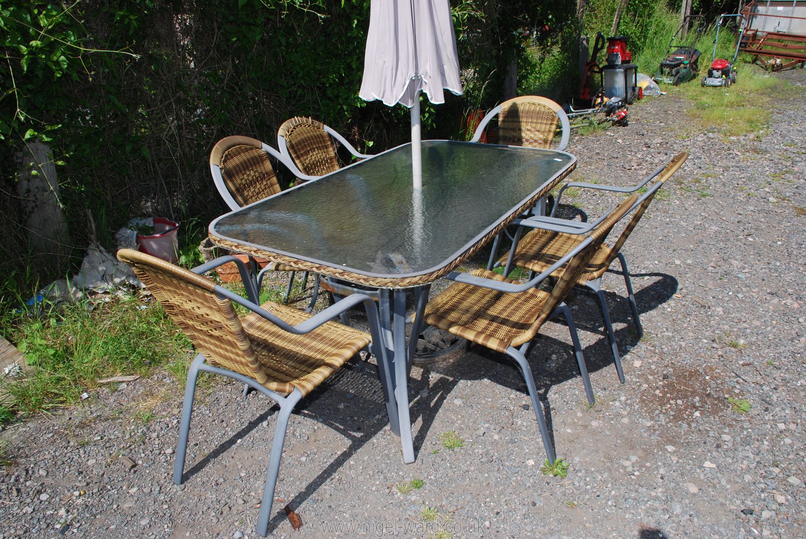 A glass patio table, six chairs and umbrella (no drive bar). - Image 3 of 3