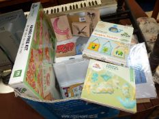 A quantity of craft kits, a cutting machine, stamps, etc.