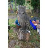A carved wooden owl, 32" tall.