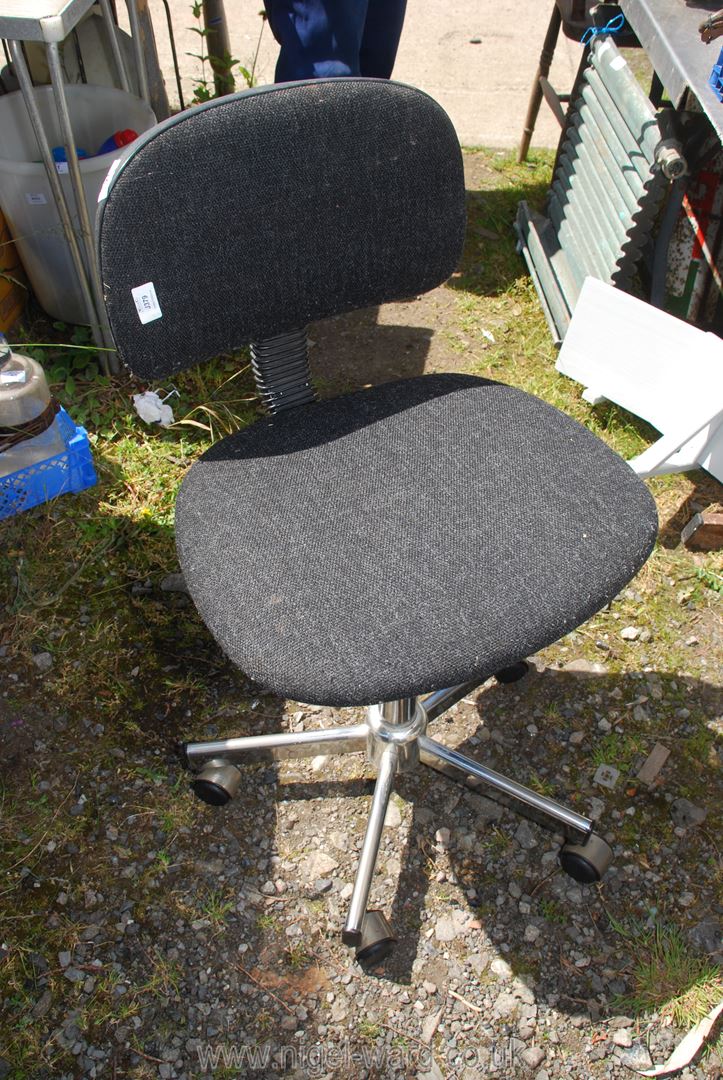 An office swivel chair.