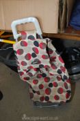A foot rest, collapsible stool, ladder brace, shopping trolley etc.