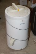 A Miele spin dryer.