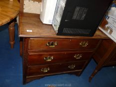 A chest of three drawers with swan neck brass handles, 36" x 172" x 30" high.