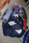 Two bags of bedding and fancy dress outfits, clothes, shirts etc.