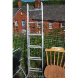 A double opening metal ladder.