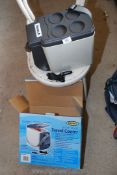 A 6 litre/12 volt car travel cooler.