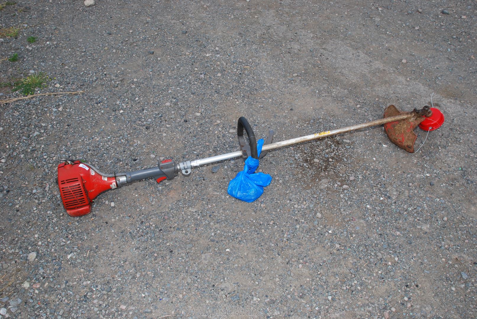 An Efco petrol strimmer.