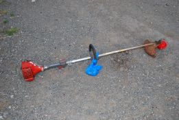 An Efco petrol strimmer.