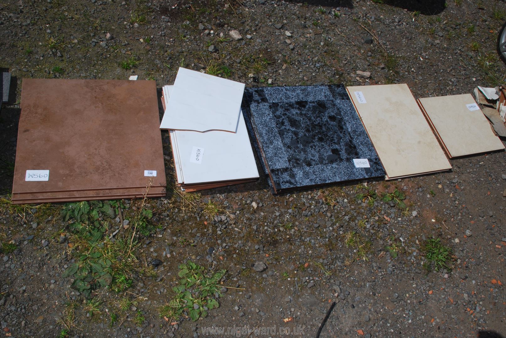 A quantity of mixed wall and floor tiles, various colours.