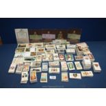 A box of Cigarette Cards in sets/part sets, odd cards and sets of Virginia canvas cigarette cards.