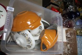 A quantity of Poole Pottery serving dishes, meat plate, dinner plates, gravy boat and saucer,