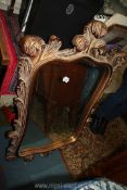 An unusual shaped, bevelled wall Mirror,