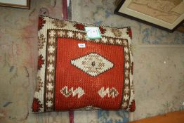 A French Aubusson needlework cushion, 22'' square.