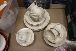 A part Royal Doulton 'Diana' pattern dinner service including cups, saucers, dinner plates,