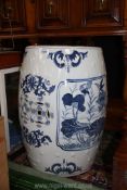 A blue and white pierced ceramic Stool with water lily and bird detail, 18 1/2'' tall.