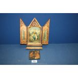 A gilded wood Tryptic with printed scenes depicting religious figures with angels on the outer