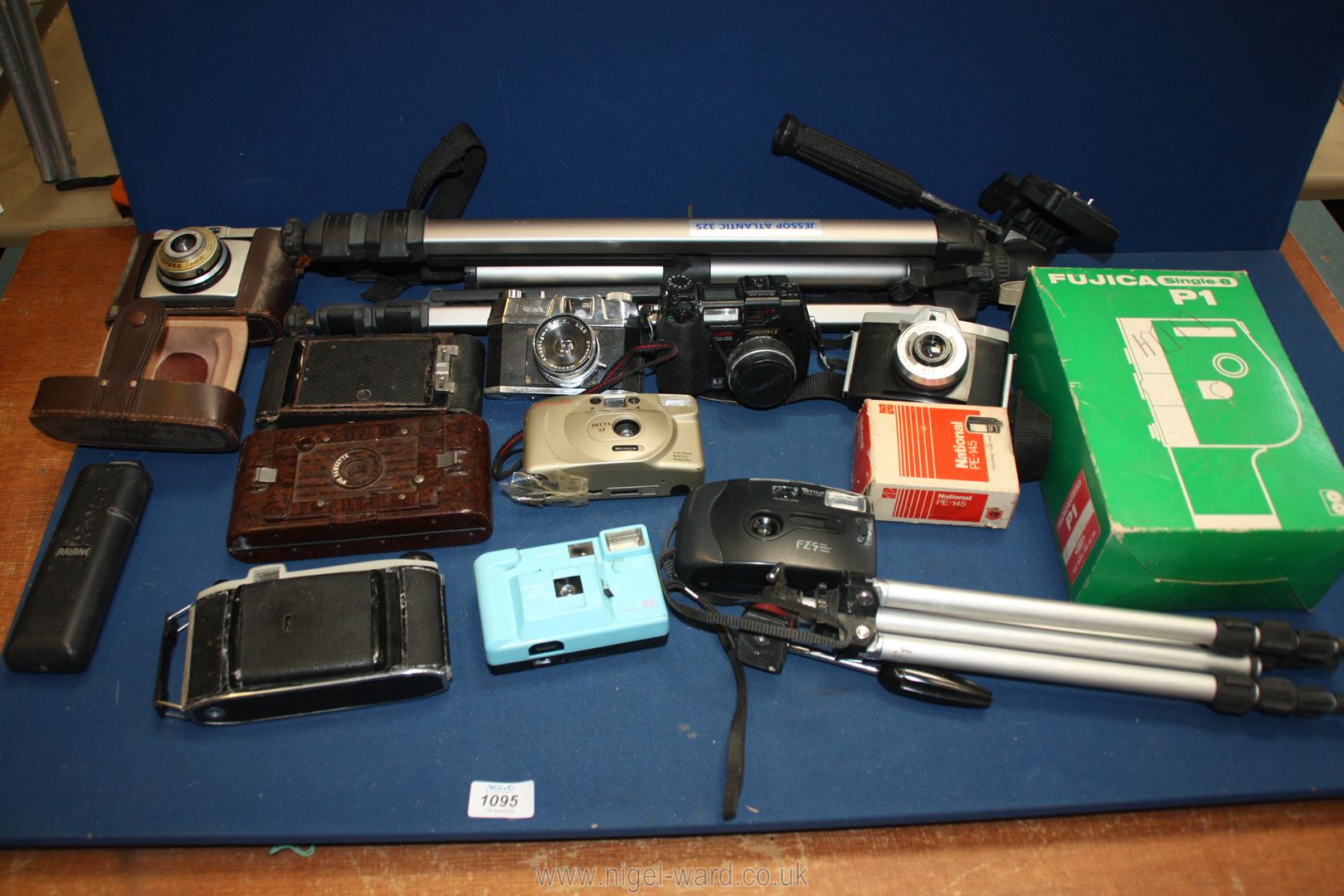 A quantity of cameras and accessories to include Olympus, Ilford,