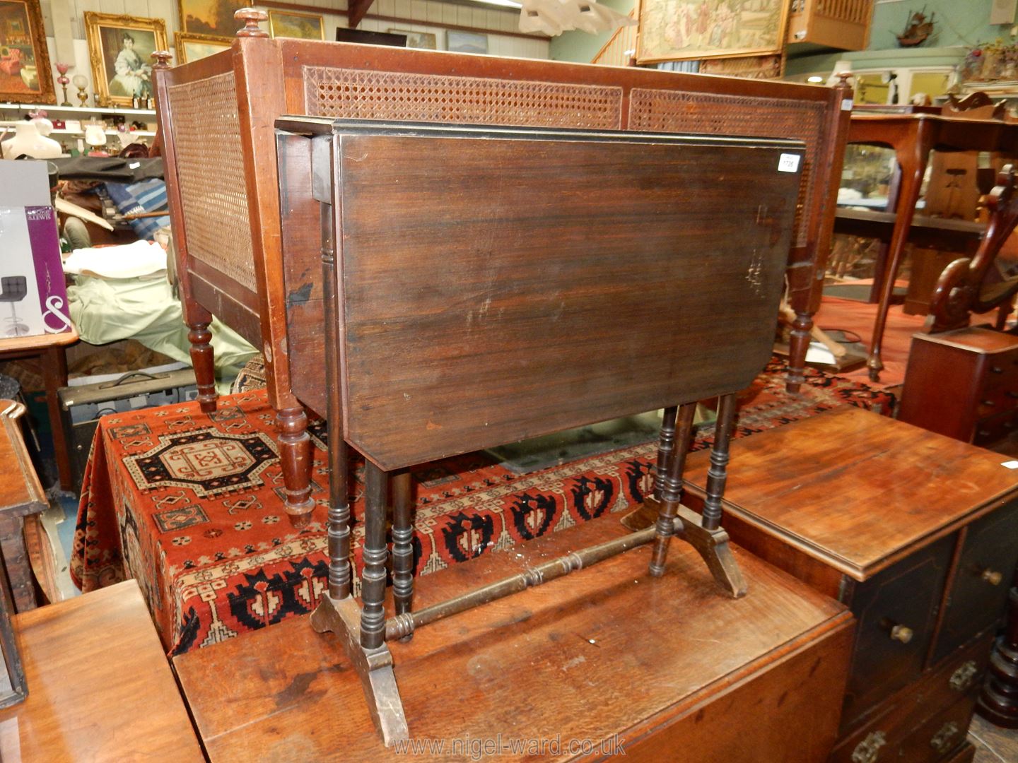 A circa 1900 dark Mahogany Sutherland Table standing on turned supports, - Image 2 of 2