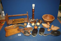 A quantity of Treen including dustpan and brush, book rest, table lamp, rasp instrument, bowl,