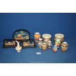 A box of oriental items to include cork pictures and china vases etc.